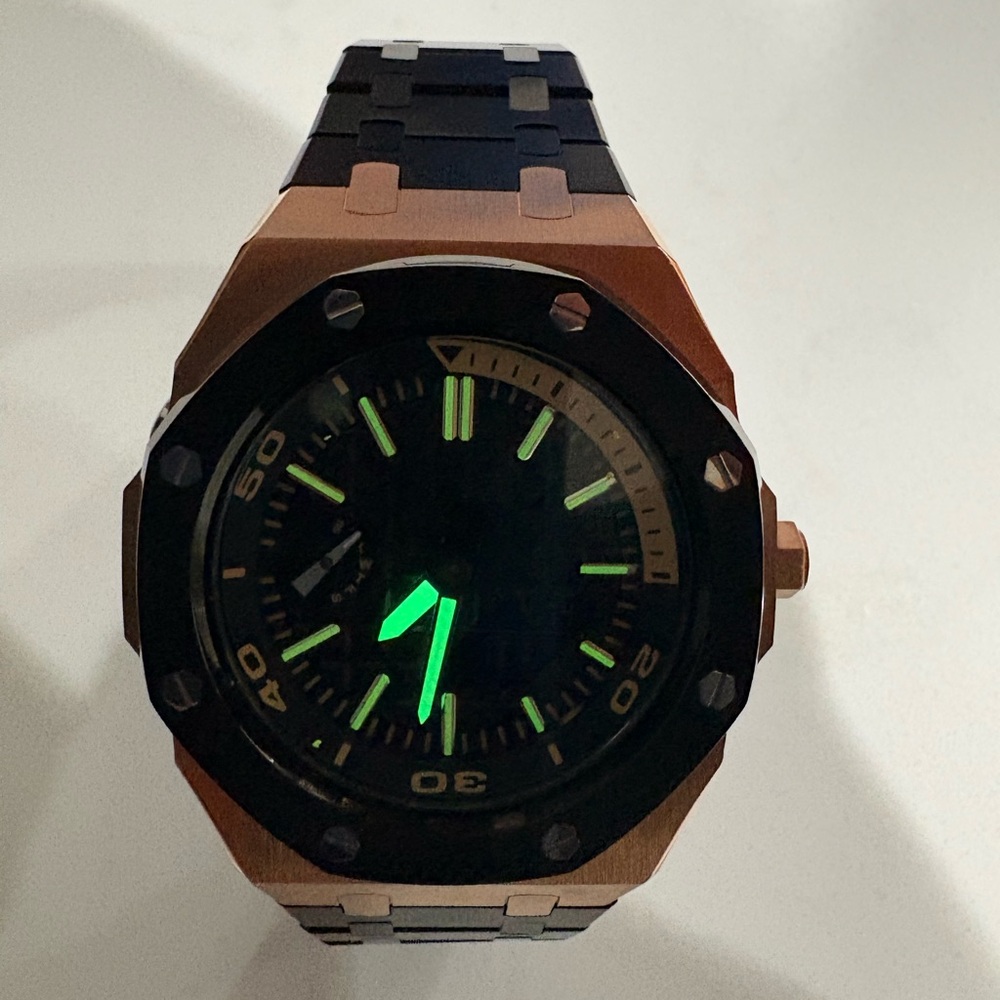 Octagonal Black and Gold Watch with Luminous Features